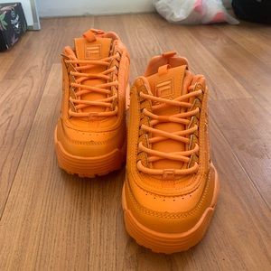 Woman’s FILA Disruptor Orange Shoes